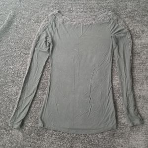 NWOT black top with lace sleeves and collar